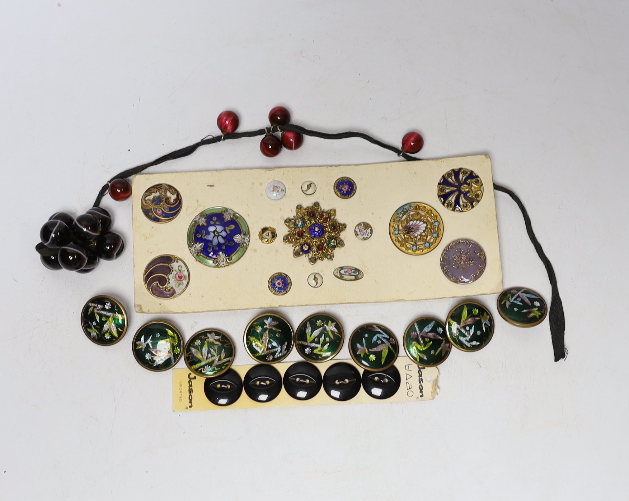 A quantity of enamel buttons, etc.